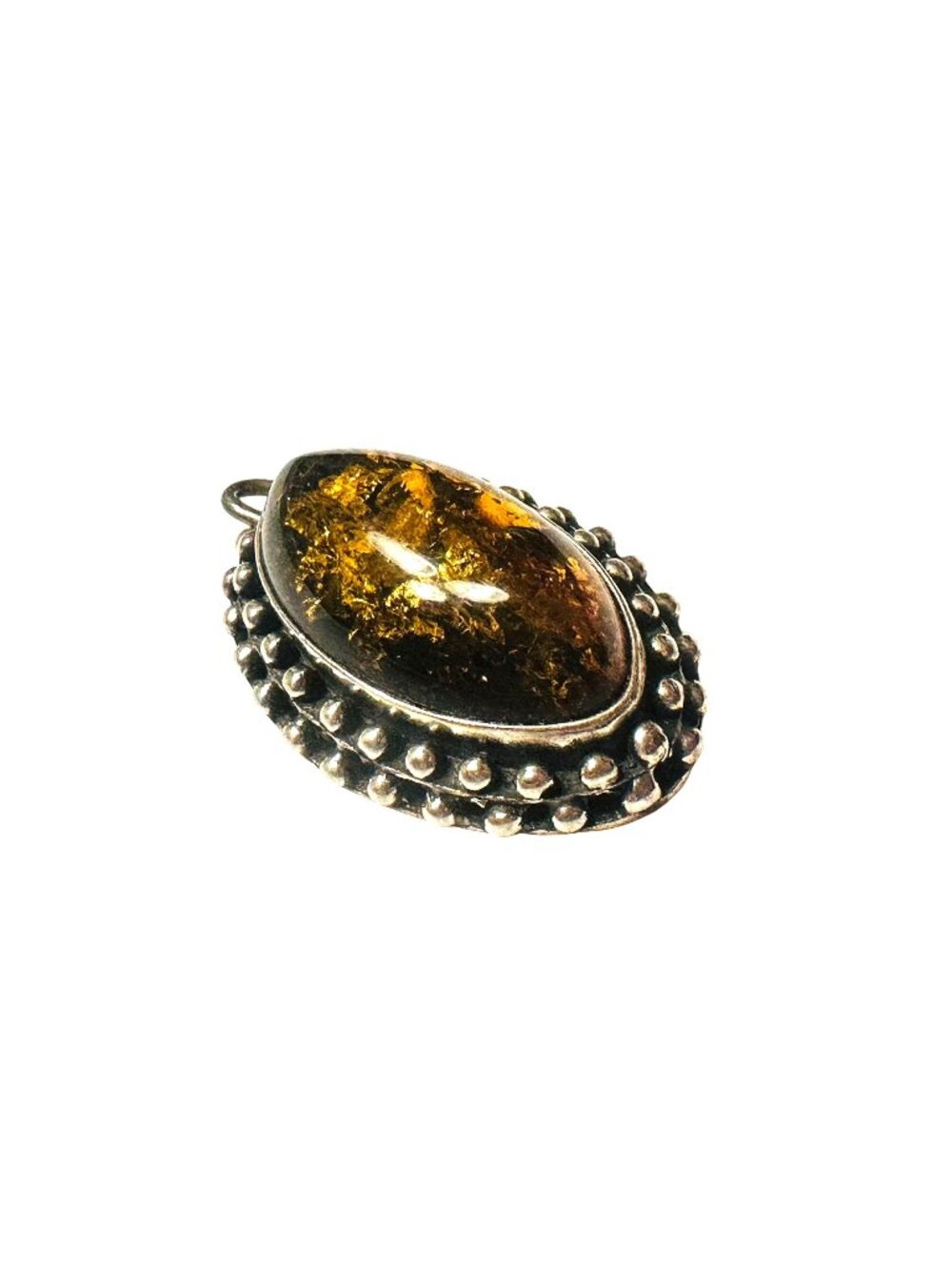 Amber Pendant With Silver Tone Ornate Bezel Setting